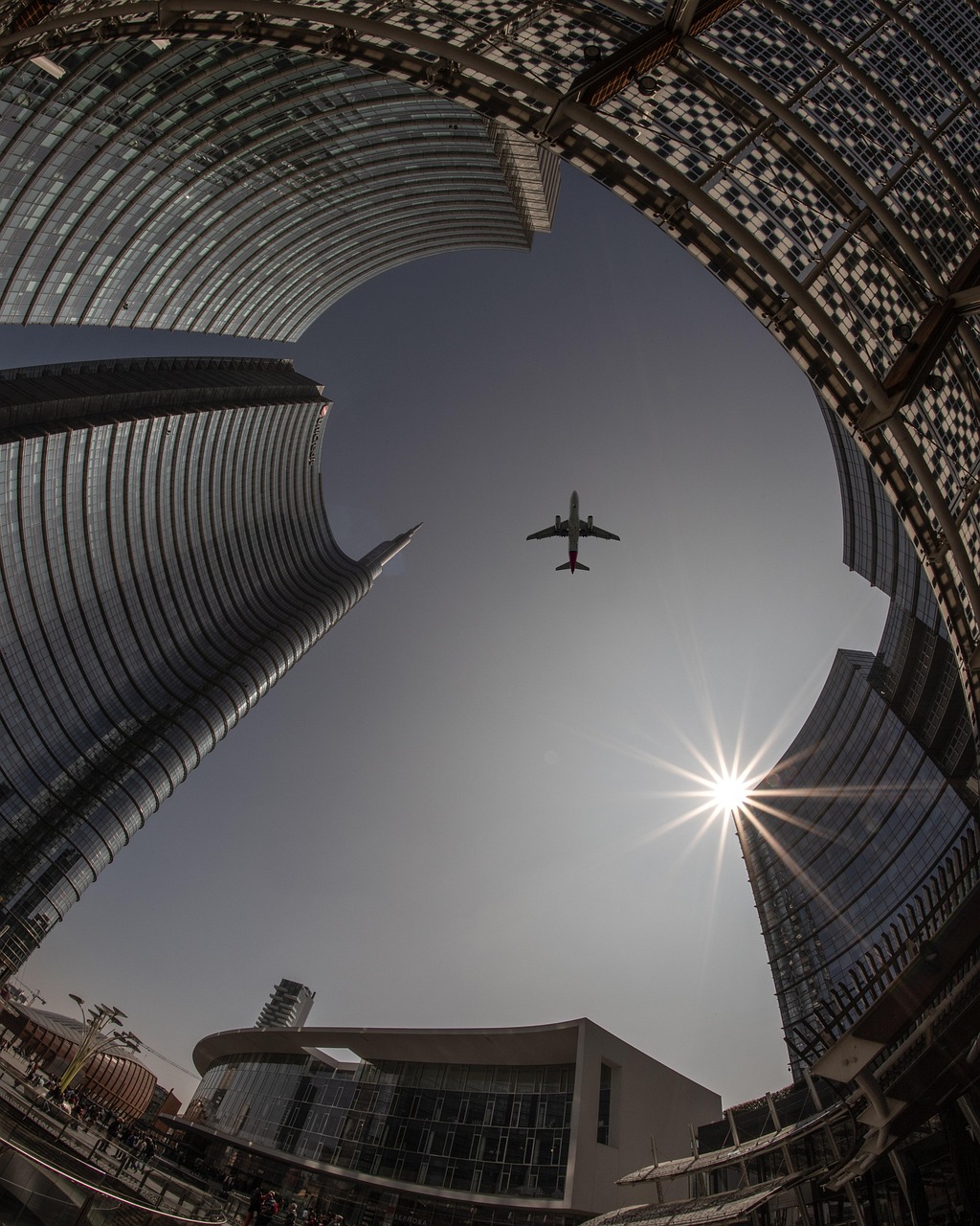 plane, city, architecture, sky, airplane, flight, travel, sun, urban, buildings, tourism, outdoors, transportation, cityscape, skyline, tower, nature, skyscrapers, lookup, aircraft